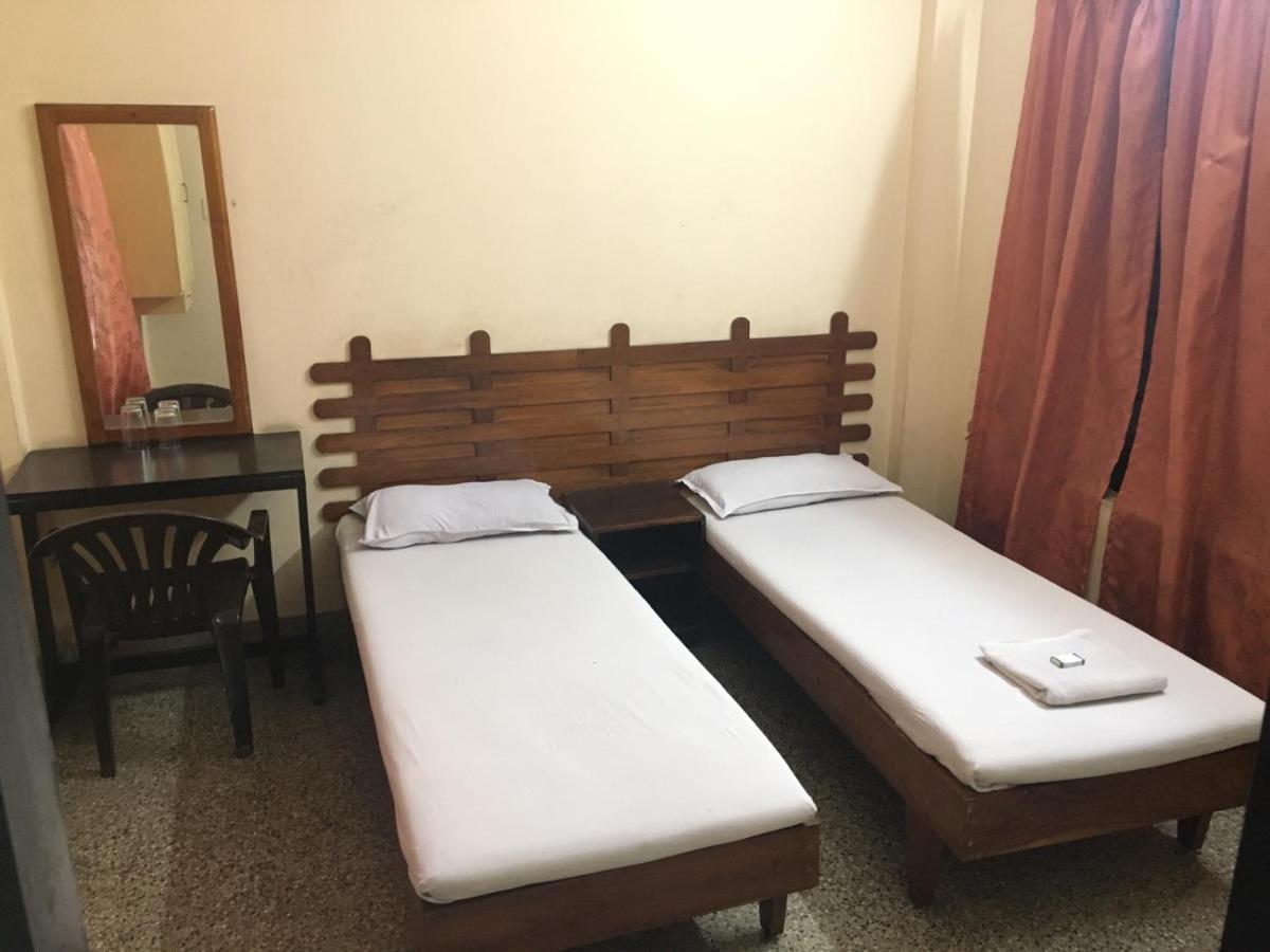 Nellimoottil Guest House Kottayam Oda fotoğraf
